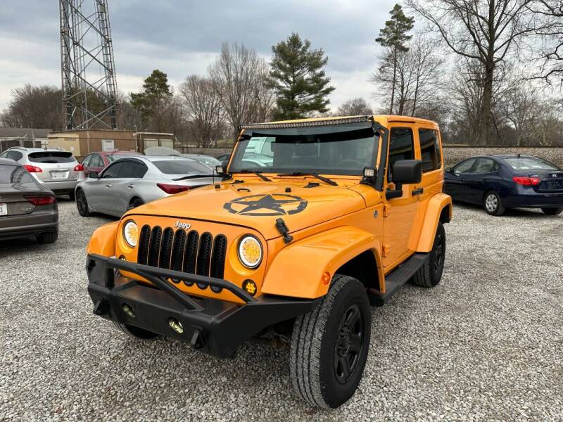 2013 Jeep Wrangler for sale at Lake Auto Sales in Hartville OH