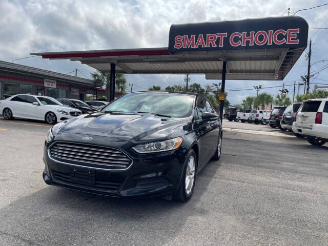 2014 Ford Fusion for sale at SMART CHOICE AUTO in Pasadena, TX