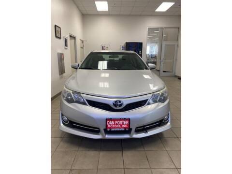 2013 Toyota Camry for sale at DAN PORTER MOTORS in Dickinson ND