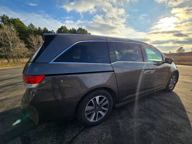 2014 Honda Odyssey for sale at Dedicated Auto Sales Inc in Elk River, MN