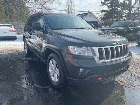 2011 Jeep Grand Cherokee for sale at Select Auto Group in Wyoming MI