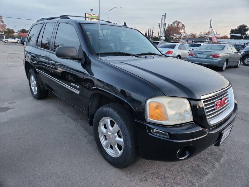 2006 GMC Envoy for sale at COMMUNITY AUTO in Fresno CA