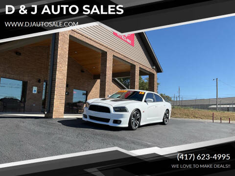 2013 Dodge Charger for sale at D & J AUTO SALES in Joplin MO