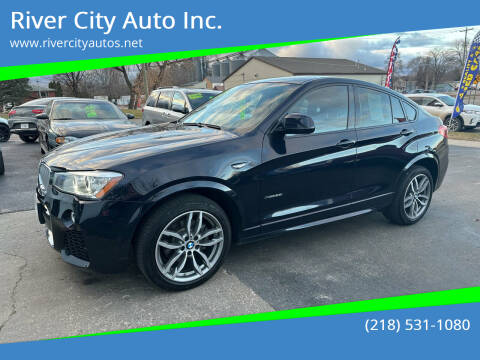 2016 BMW X4 for sale at River City Auto Inc. in Fergus Falls MN