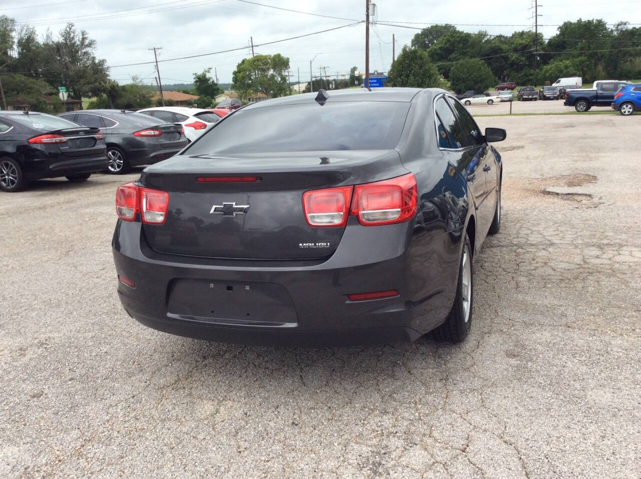 2013 Chevrolet Malibu for sale at SPRINGTIME MOTORS in Huntsville, TX