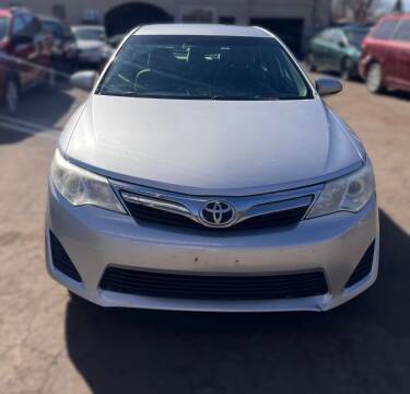 2012 Toyota Camry for sale at Queen Auto Sales in Denver CO