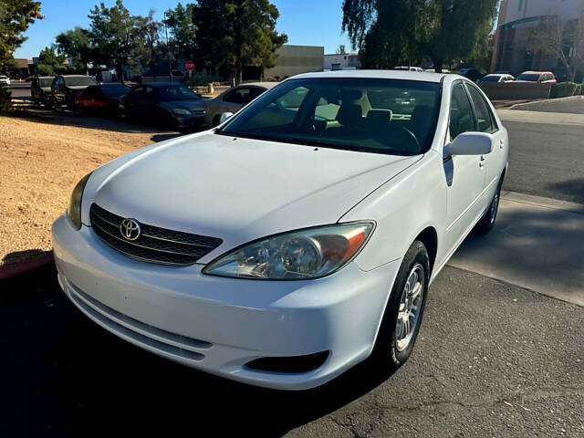 2002 Toyota Camry for sale at HUDSONS AUTOS in Gilbert, AZ