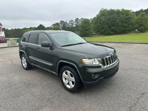 2011 Jeep Grand Cherokee for sale at First Auto Sales in Winder GA