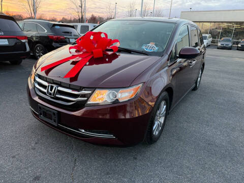 2014 Honda Odyssey for sale at Charlotte Auto Group, Inc in Monroe NC