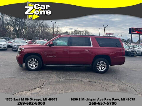 2015 Chevrolet Suburban for sale at Car Zone in Otsego MI
