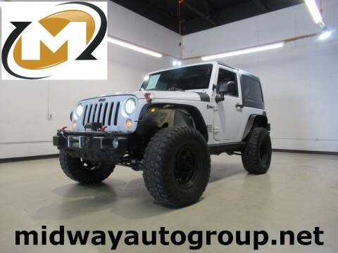 2015 Jeep Wrangler for sale at Midway Auto Group in Addison TX