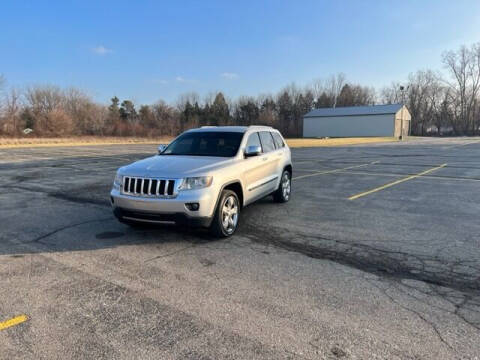 2012 Jeep Grand Cherokee for sale at Caruzin Motors in Flint MI