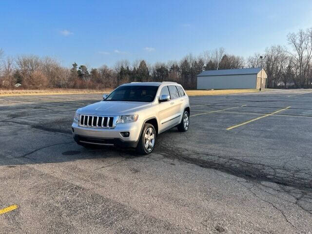 2012 Jeep Grand Cherokee for sale at Caruzin Motors in Flint MI