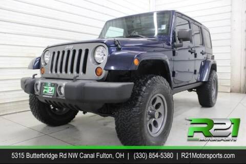 2013 Jeep Wrangler Unlimited for sale at Route 21 Auto Sales in Canal Fulton OH