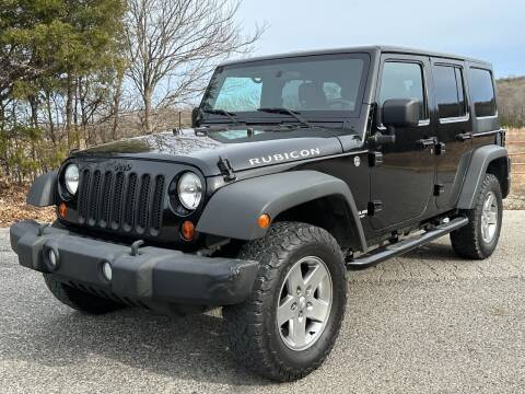 2011 Jeep Wrangler Unlimited for sale at TINKER MOTOR COMPANY in Indianola OK