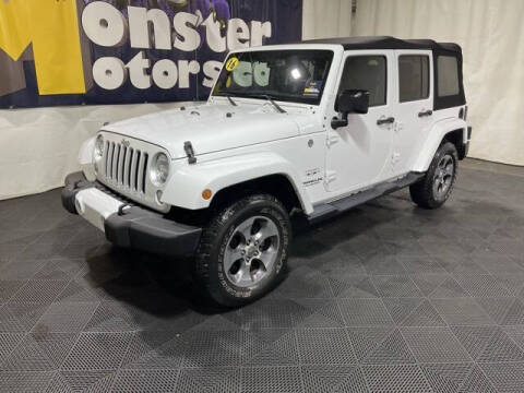 2016 Jeep Wrangler Unlimited for sale at Monster Motors in Michigan Center MI