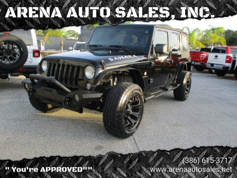 2016 Jeep Wrangler Unlimited for sale at ARENA AUTO SALES,  INC. in Holly Hill FL