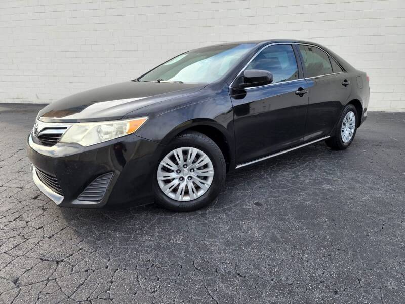 2012 Toyota Camry for sale at AUTO FIESTA in Norcross GA