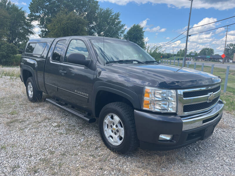 2011 Chevrolet Silverado 1500 for sale at HEDGES USED CARS in Carleton MI