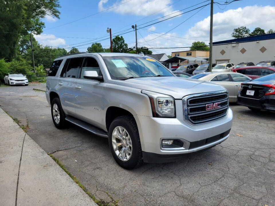 2016 GMC Yukon for sale at DAGO'S AUTO SALES LLC in Dalton, GA