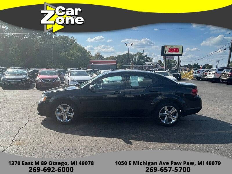 2011 Dodge Avenger for sale at Car Zone in Otsego MI