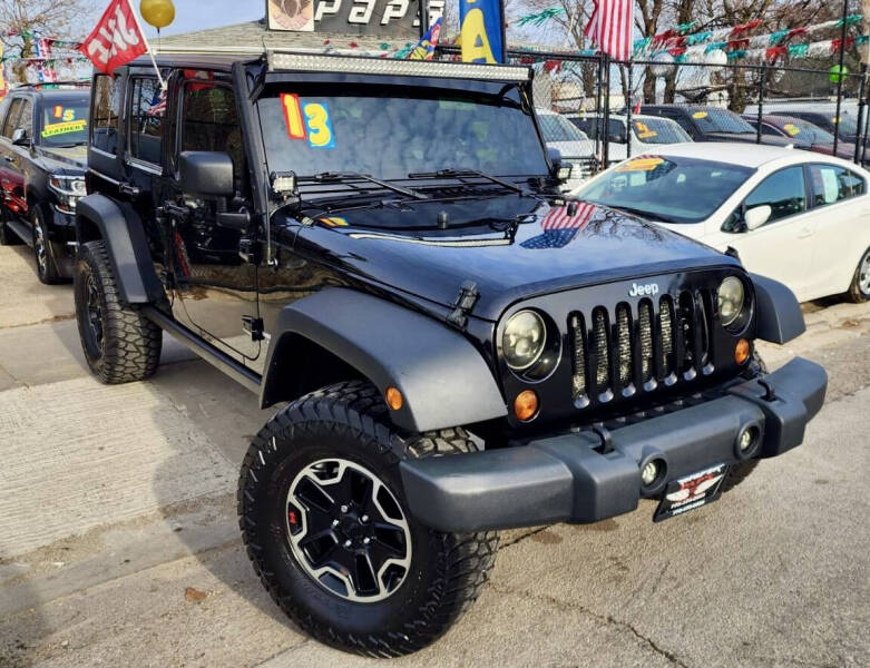 2013 Jeep Wrangler Unlimited for sale at Paps Auto Sales in Chicago IL