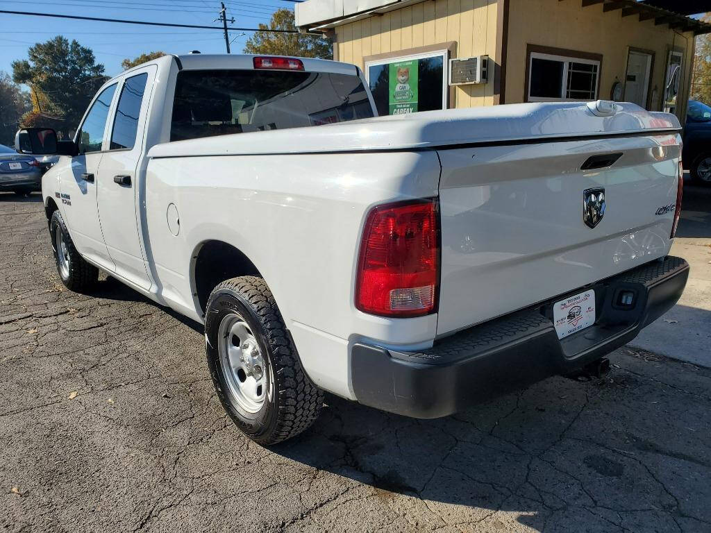 2014 Ram 1500 for sale at DAGO'S AUTO SALES LLC in Dalton, GA