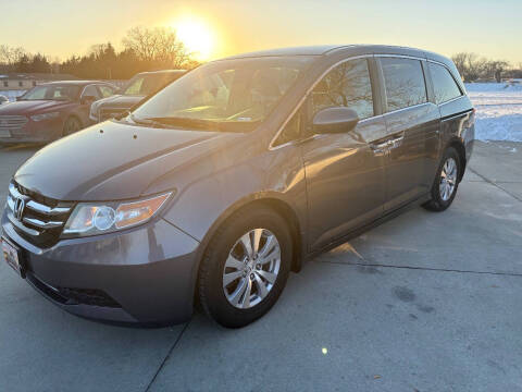 2015 Honda Odyssey for sale at Azteca Auto Sales LLC in Des Moines IA