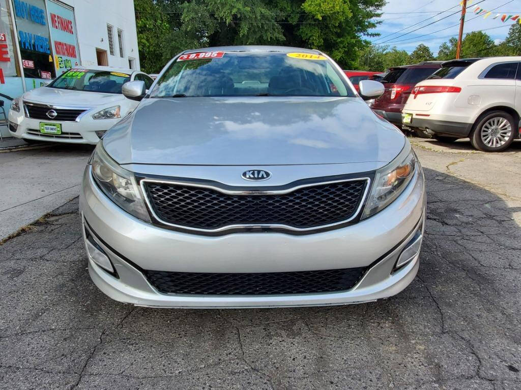 2014 Kia Optima for sale at DAGO'S AUTO SALES LLC in Dalton, GA