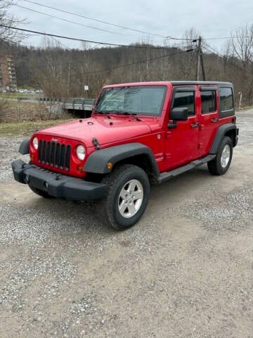 2011 Jeep Wrangler Unlimited for sale at WESTON MOTORS INC in Weston WV