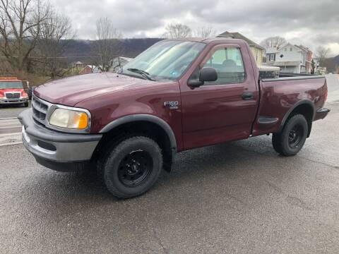 1998 Ford F-150 for sale at George's Used Cars Inc in Orbisonia PA
