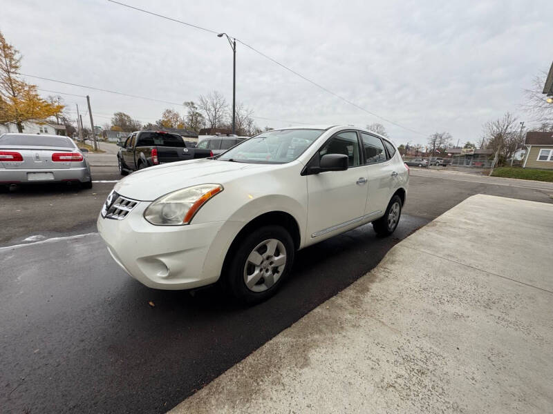 2011 Nissan Rogue for sale at The Car Cove, LLC in Muncie IN