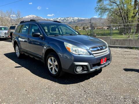2014 Subaru Outback for sale at The Car-Mart in Bountiful UT
