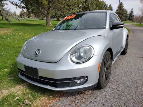 2012 Volkswagen Beetle for sale at BELOW BOOK AUTO SALES in Idaho Falls ID