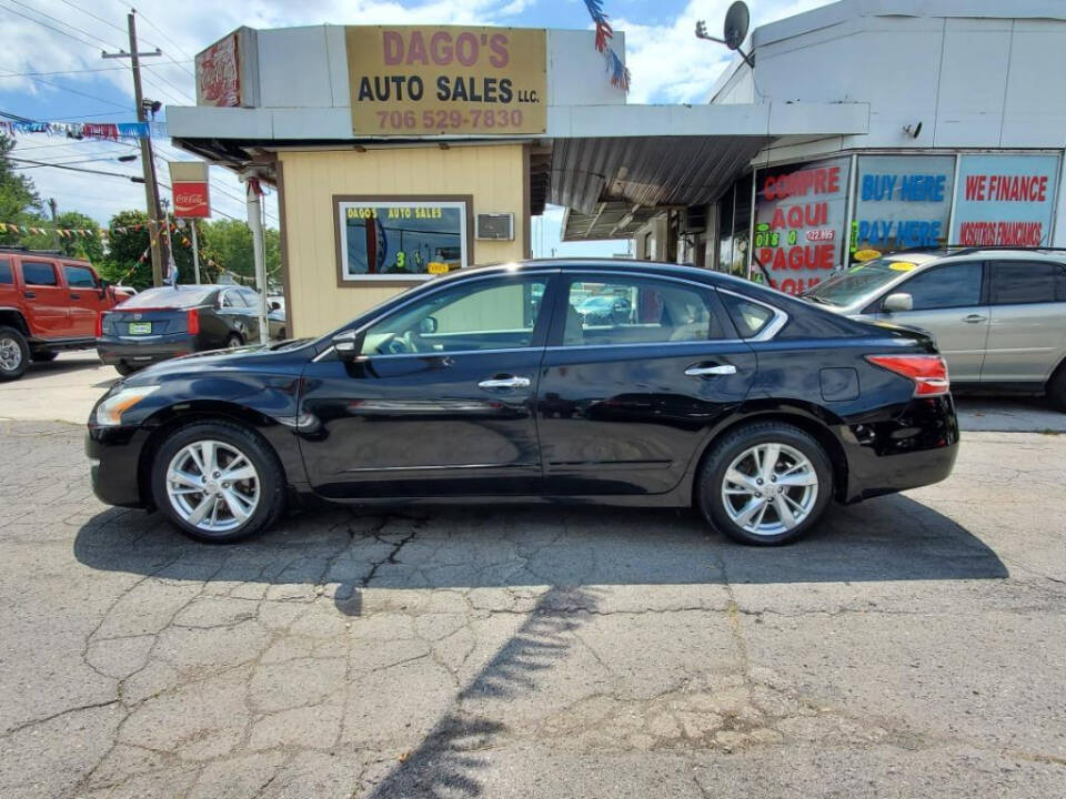 2015 Nissan Altima for sale at DAGO'S AUTO SALES LLC in Dalton, GA