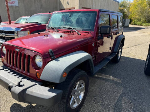 2012 Jeep Wrangler Unlimited for sale at BEAR CREEK AUTO SALES in Spring Valley MN