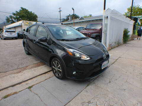 2018 Toyota Prius c for sale at ARAX AUTO SALES in Tujunga CA