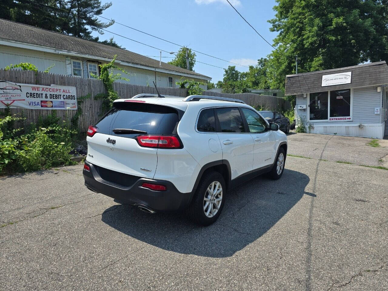 2015 Jeep Cherokee for sale at PAKLAND AUTO SALES in Auburn, MA