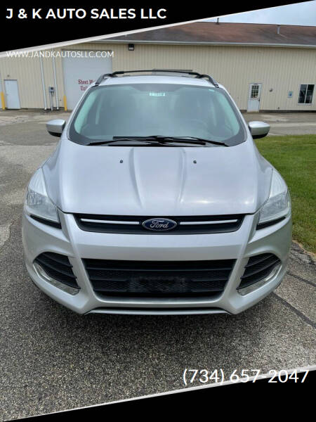 2013 Ford Escape for sale at J & K AUTO SALES LLC in Holland MI