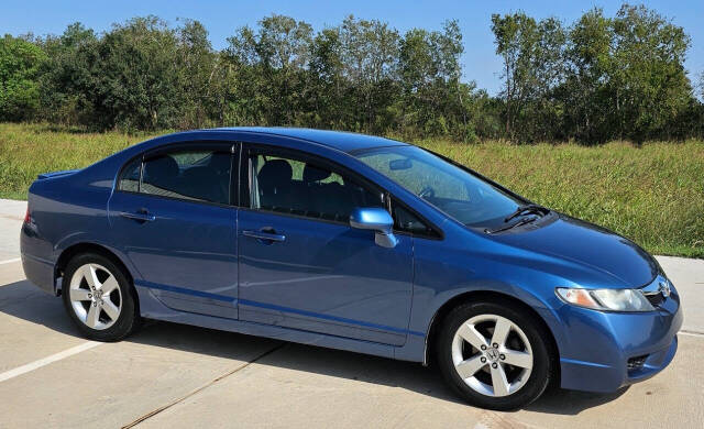 2011 Honda Civic for sale at CAR MARKET AUTO GROUP in Sugar Land, TX