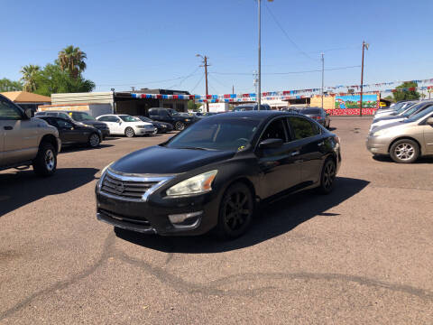 2014 Nissan Altima for sale at Valley Auto Center in Phoenix AZ