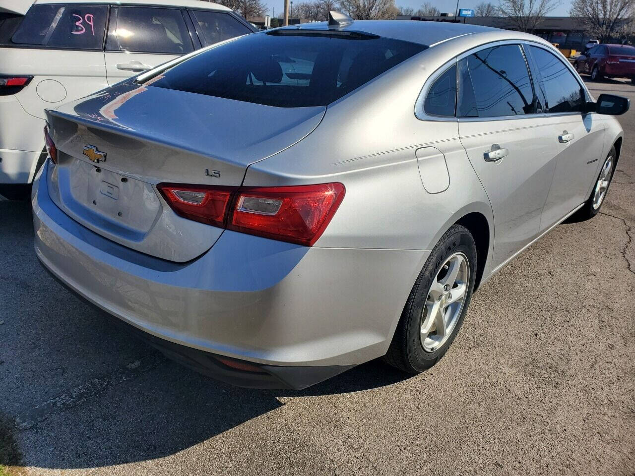 2016 Chevrolet Malibu for sale at DURANGO AUTO CENTER LLC in Tulsa, OK