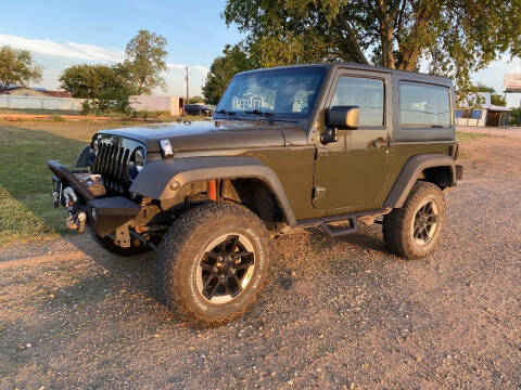 2015 Jeep Wrangler for sale at CAVENDER MOTORS in Van Alstyne TX