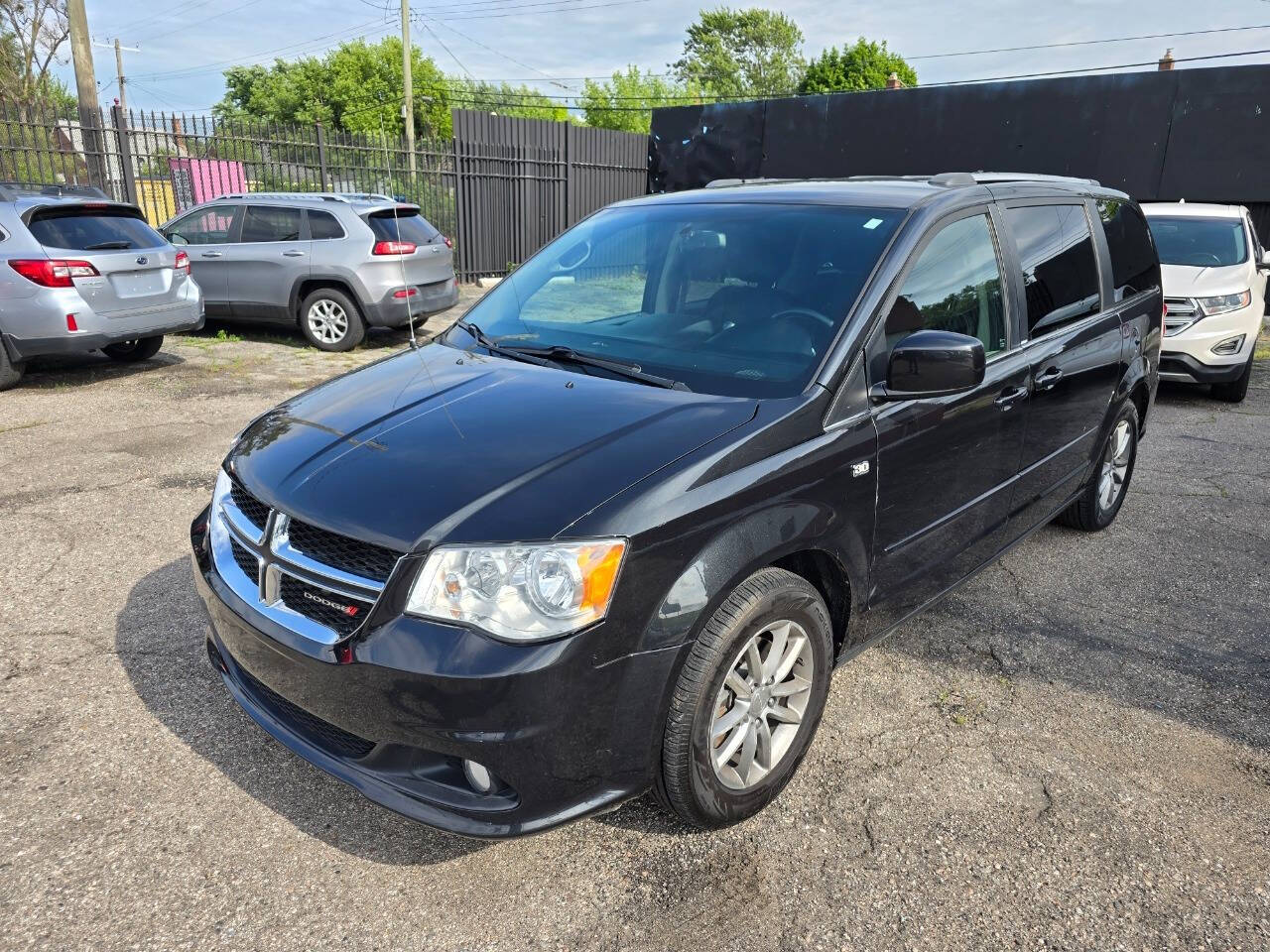 2014 Dodge Grand Caravan for sale at TMY AUTO in Detroit, MI