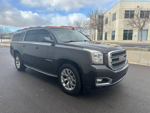 2015 GMC Yukon XL for sale at The Car-Mart in Bountiful UT