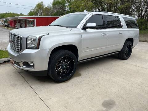 2015 GMC Yukon XL for sale at Azteca Auto Sales LLC in Des Moines IA