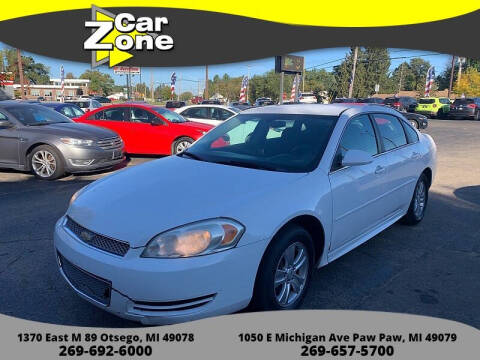 2013 Chevrolet Impala for sale at Car Zone in Otsego MI