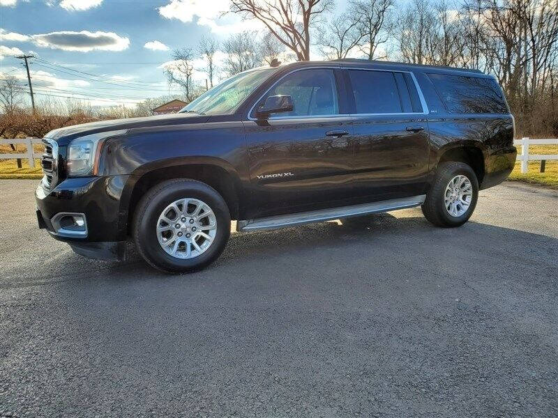 2015 GMC Yukon XL for sale at Woodcrest Motors in Stevens PA