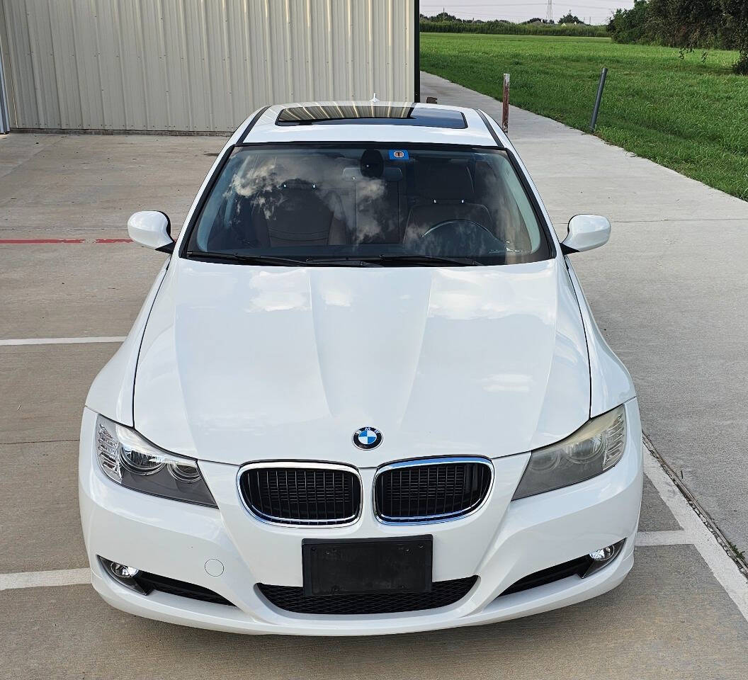 2011 BMW 3 Series for sale at CAR MARKET AUTO GROUP in Sugar Land, TX