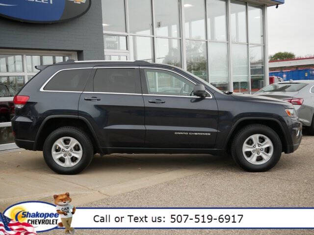 Used 2014 Jeep Grand Cherokee Laredo with VIN 1C4RJFAG0EC516321 for sale in Shakopee, Minnesota